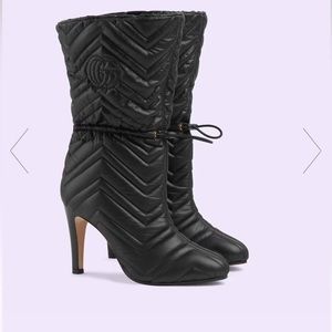 GUCCI: Women's GG matelassé boot